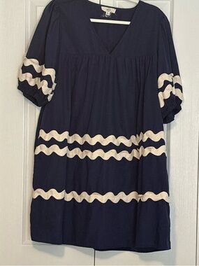 entro Navy Baby Doll Dress with Cream Wave Trim